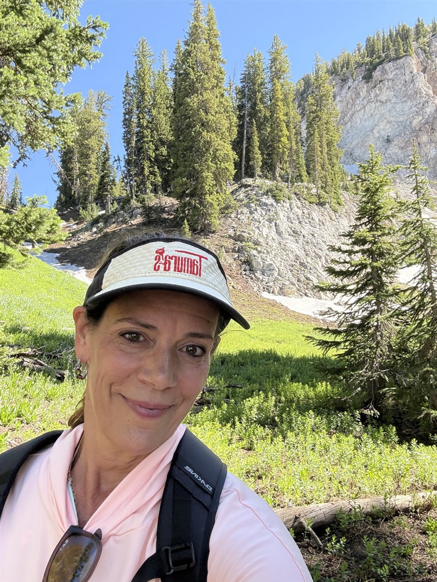 Michelle Annette hiking in the mountains
